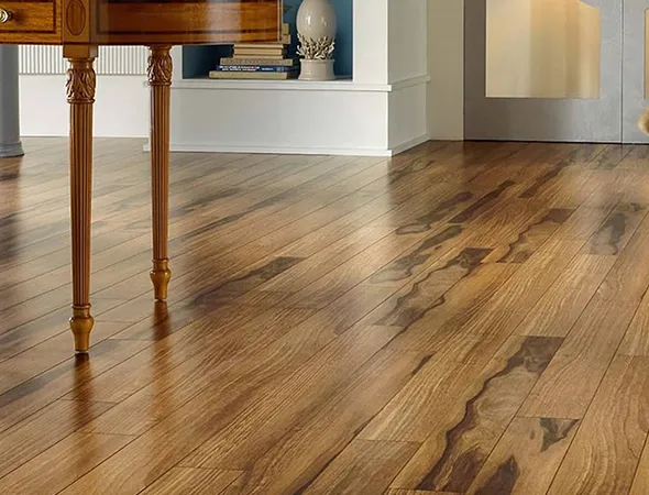 Rich brown LVP wood-style flooring installed with precision, offering a warm and durable finish.