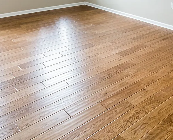 A sleek space featuring elegant wooden flooring that adds warmth, character, and timeless style to any room.